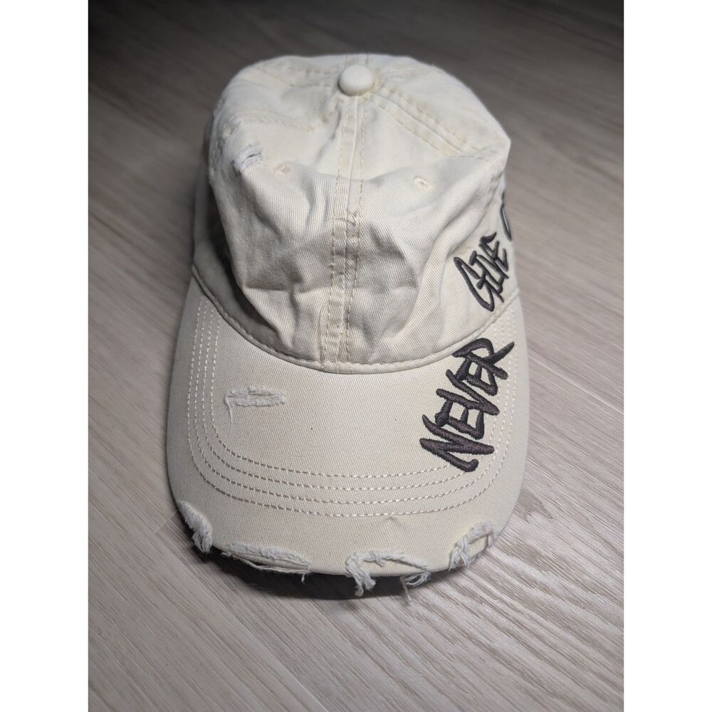 Distressed Cream Ivory Baseball Cap Black Embroidered Graphic "Never Give Up"